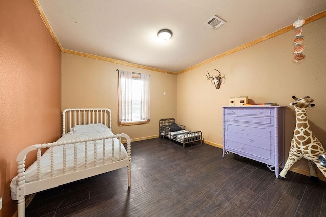 bedroom featuring dark hardwood / wood-style flooring and ornamental molding