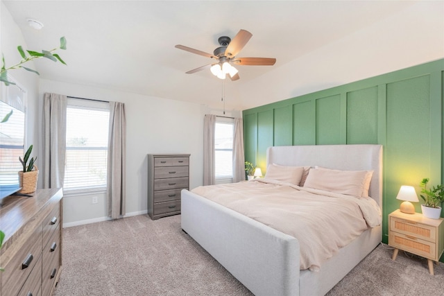 bedroom featuring ceiling fan and light colored carpet