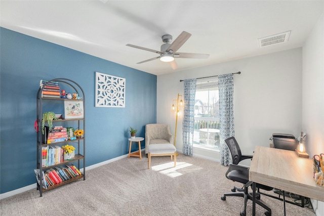 office space with carpet flooring and ceiling fan