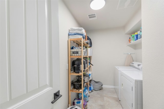 laundry area featuring independent washer and dryer