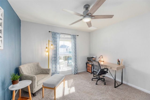 carpeted home office with ceiling fan