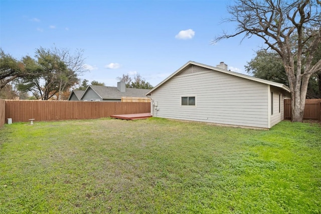 view of yard with a wooden deck