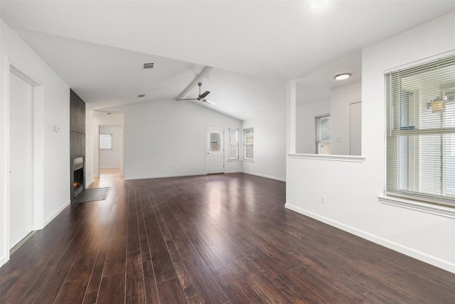 unfurnished living room with lofted ceiling with beams, ceiling fan, and dark hardwood / wood-style flooring