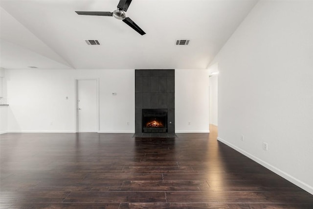 unfurnished living room featuring a fireplace, hardwood / wood-style floors, ceiling fan, and lofted ceiling