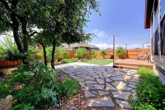 view of patio / terrace featuring a wooden deck