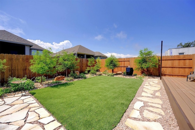 view of yard with a wooden deck