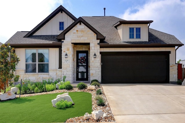 view of front facade with a front lawn and a garage