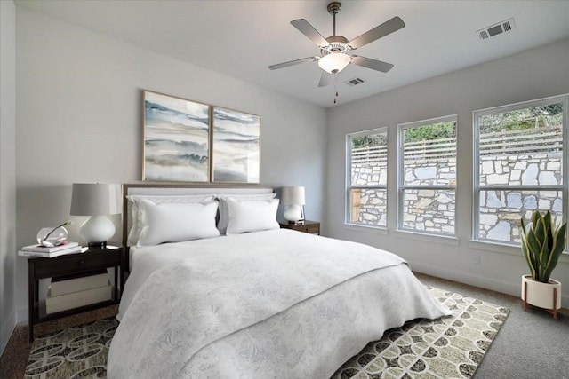 carpeted bedroom featuring ceiling fan