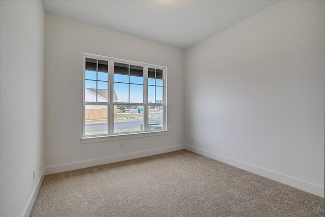 empty room featuring carpet flooring