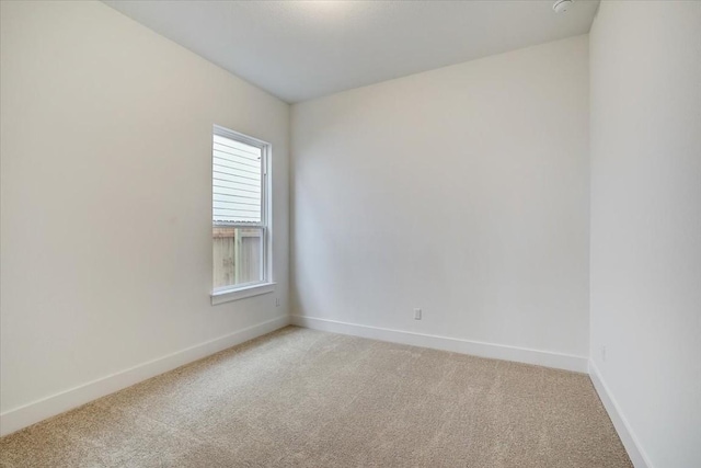 unfurnished room featuring carpet floors