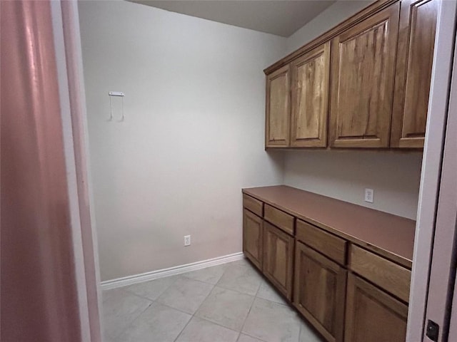 interior space with light tile patterned flooring