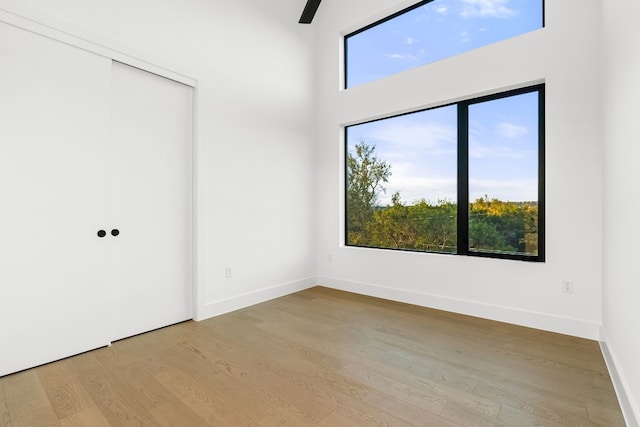 empty room with light hardwood / wood-style floors