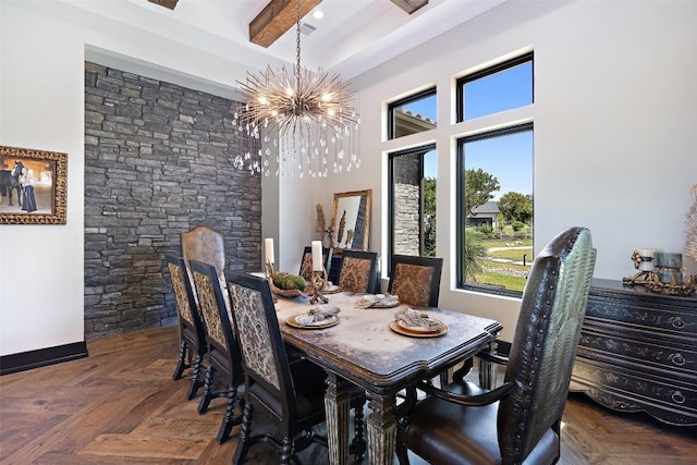 dining room featuring dark parquet floors, beam ceiling, and an inviting chandelier