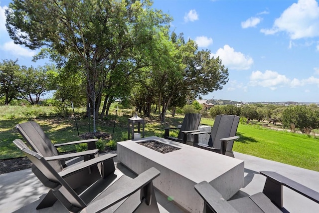 view of patio featuring an outdoor fire pit