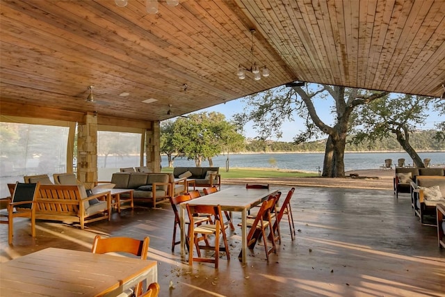 deck featuring a water view and an outdoor hangout area