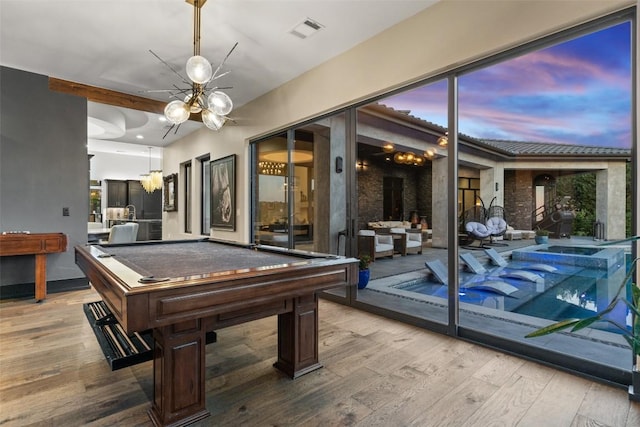 19204 Secretariat Pl, Spicewood, TX 78669 - game room featuring wood finished floors, pool table, and a ceiling fan