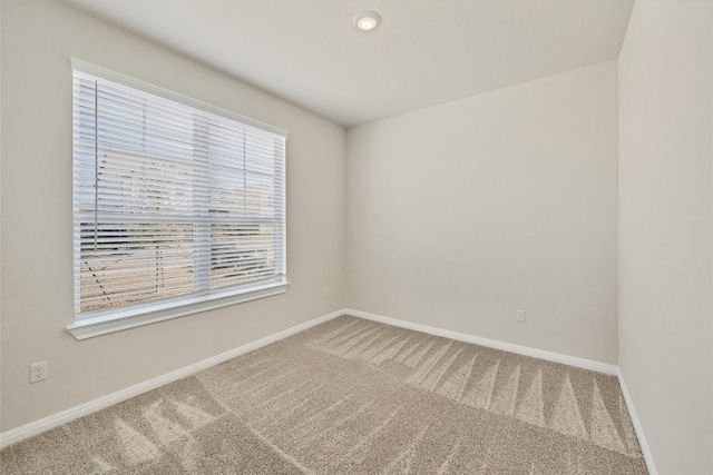 empty room with carpet floors