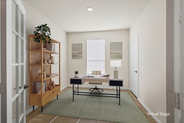 home office featuring hardwood / wood-style floors