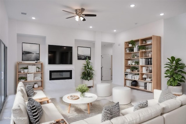 living room featuring ceiling fan