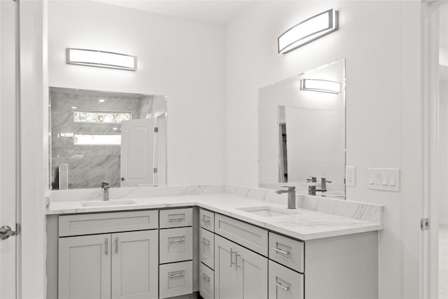 bathroom featuring vanity and walk in shower