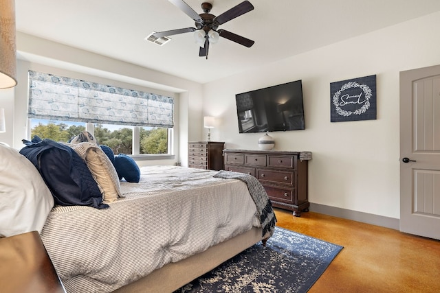 bedroom featuring baseboards, visible vents, and a ceiling fan