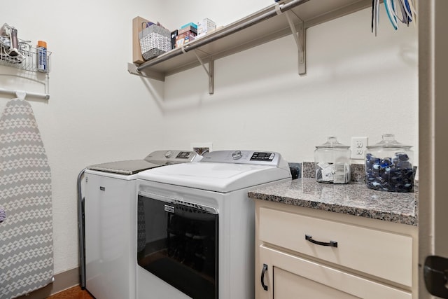 clothes washing area with laundry area and separate washer and dryer