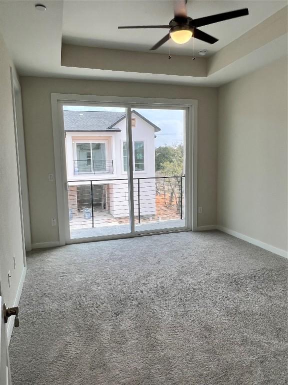 12001 Vista Parke Dr Unit 1202, Austin, TX 78726 - spare room featuring carpet floors and a ceiling fan