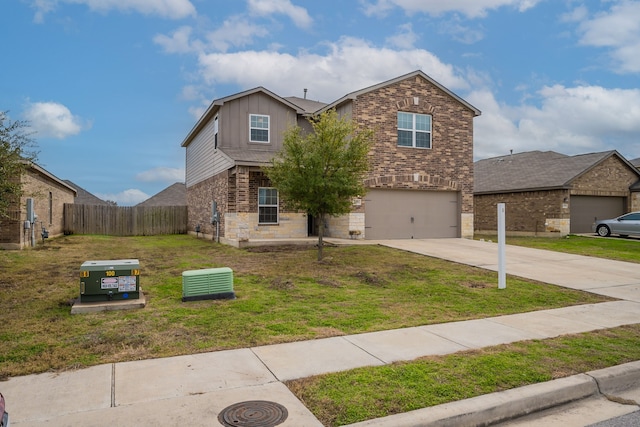 view of front facade featuring a front lawn and a garage