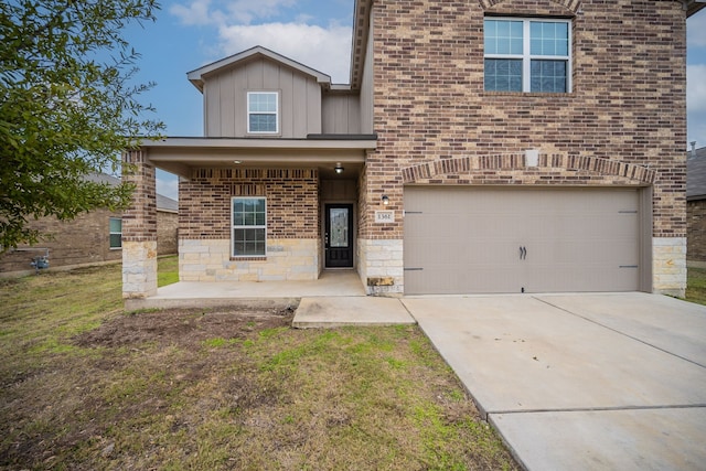 view of front of property with a garage