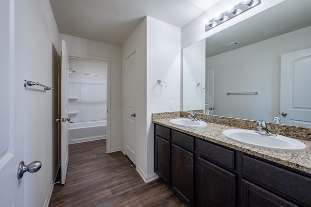 bathroom featuring hardwood / wood-style floors and vanity