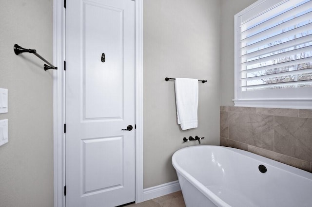 bathroom with a tub