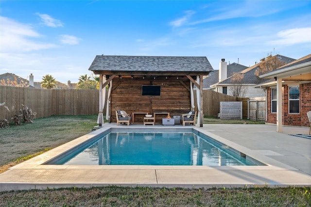 view of swimming pool with a patio area