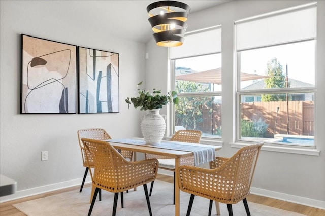 dining space featuring light hardwood / wood-style flooring