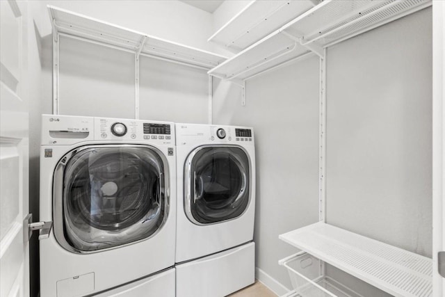 laundry area featuring washer and clothes dryer