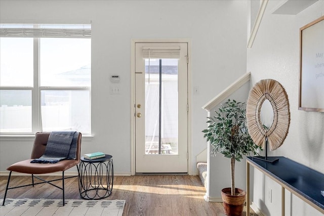 entryway with light hardwood / wood-style flooring