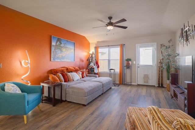 12110 Riprap Dr, Manor, TX 78653 - living room featuring wood finished floors, ceiling fan, and baseboards