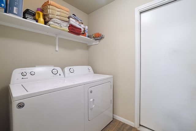 12110 Riprap Dr, Manor, TX 78653 - washroom with washing machine and dryer, light wood-type flooring, and baseboards