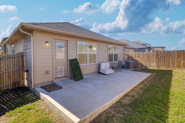 12110 Riprap Dr, Manor, TX 78653 - rear view of property featuring a patio and central AC