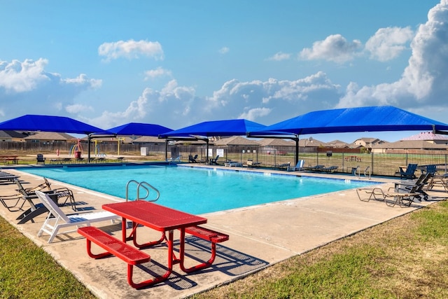 12110 Riprap Dr, Manor, TX 78653 - community pool featuring a patio