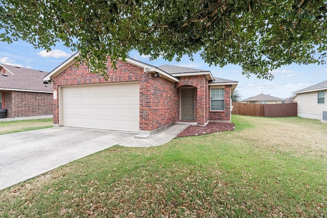 ranch-style house with a front yard and a garage