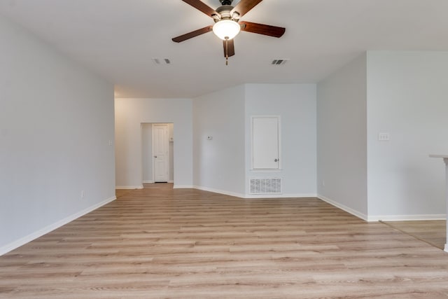 unfurnished room with ceiling fan and light wood-type flooring