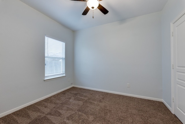 unfurnished room with carpet flooring and ceiling fan