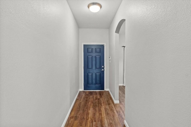 doorway featuring hardwood / wood-style flooring