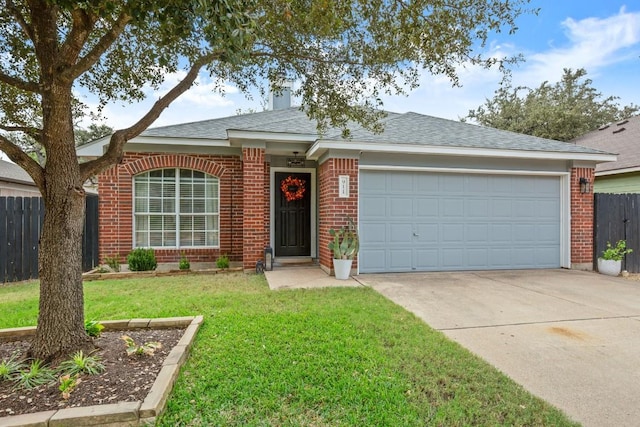 ranch-style house with a garage and a front yard