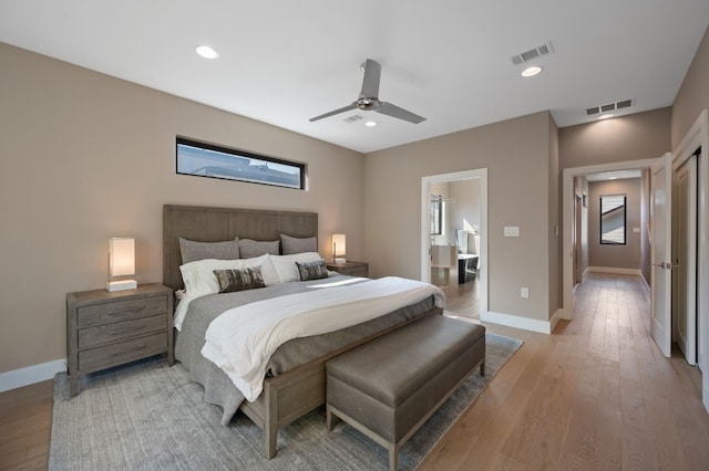 bedroom featuring ceiling fan and light hardwood / wood-style flooring