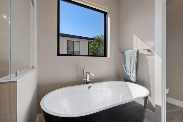 bathroom with a bathing tub