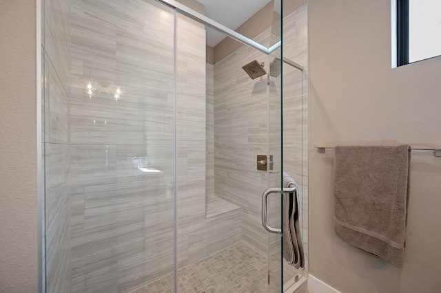 bathroom with an enclosed shower