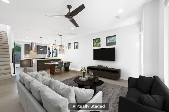 living room featuring ceiling fan