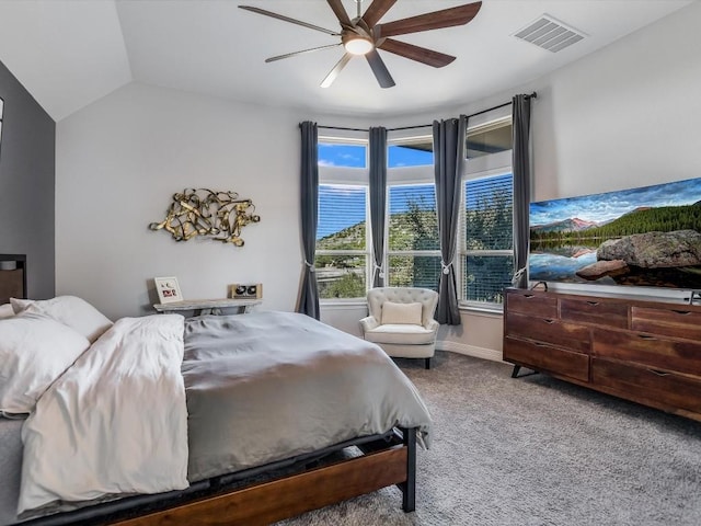 carpeted bedroom with lofted ceiling and ceiling fan