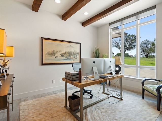 office space featuring beamed ceiling and light wood-type flooring